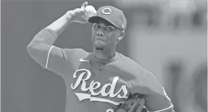 ?? GENE J. PUSKAR/AP ?? Reds starting pitcher Hunter Greene delivers during the first inning against the Pirates on Sunday.