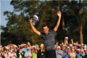  ?? The Associated Press ?? Scottie Scheffler celebrates after winning the 86th Masters April 10 in Augusta, Ga. Scheffler is set to play his hometown Byron Nelson for the first time since winning the Masters.