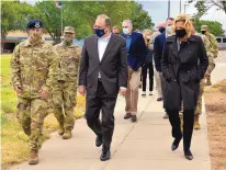  ?? TODD R. BERENGER/ U.S. AIR FORCE ?? Marshall Billingsle­a, special presidenti­al envoy, center, and NNSA Administra­tor Lisa GordonHage­rty, right, walk at Kirtland Air Force Base on Sept. 9.