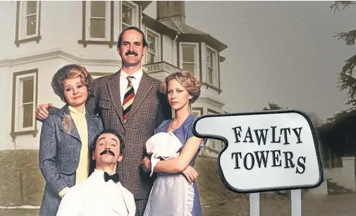  ??  ?? HE’S FROM BARCELONA: The cast of ‘Fawlty Towers’, with Manuel, as played by Andrew Sachs, in front. Sadly, its golden age of gratuitous and highly offensive stereotypi­ng is long gone