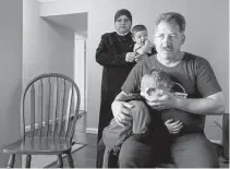  ?? Steve Gonzales / Houston Chronicle ?? Emad and Manal Alhalabeya and their family are Syrian refugees who recently arrived in Houston. They’re seen during an interview at their apartment in September.