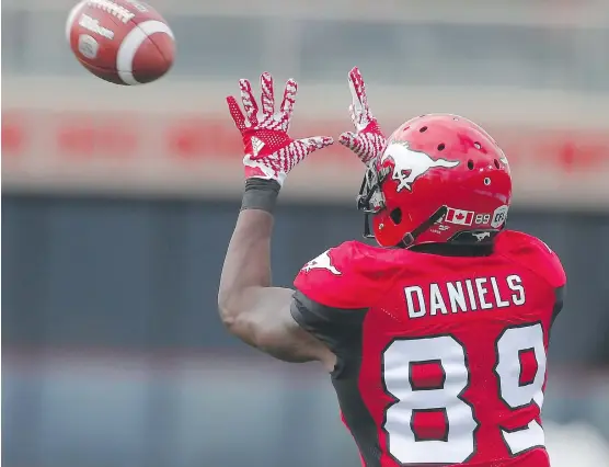  ?? AL CHAREST ?? Calgary Stampeders rookie receiver DaVaris Daniels scored his first profession­al touchdown during Sunday’s game against the Hamilton Tiger-Cats.