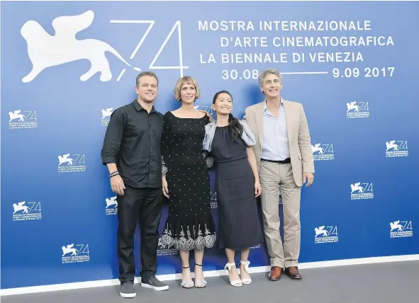  ?? — GETTY IMAGES ?? Matt Damon, left, Kristen Wiig, Hong Chau and director Alexander Payne appear at The Venice Film Festival in support of Downsizing, which will open the prestigiou­s festival.