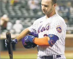  ?? Jason Szenes ?? TOO MUCH TO BEAR: Pete Alonso reacts after popping out for the final out of the Mets’ loss to the Braves.