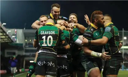  ??  ?? Northampto­n players celebrate Fraser Dingwall’s try against Leicester. Photograph: David Rogers/Getty Images