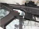  ?? Allen Breed / Associated Press 2013 ?? Bump stocks like this one shown with a .22-caliber rifle can be used to convert semiautoma­tic firearms to function like fully automatic ones.