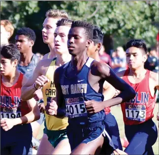  ?? Photo courtesy Margaret Reilly ?? Boys cross-country runner Dylan Gatua runs in the 5,000-meter varsity boys championsh­ip race at the Asics Clovis Invitation­al at Woodward Park in Fresno on Saturday.