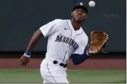  ?? (AP file photo) ?? Seattle Mariners right fielder Kyle Lewis, who played for the Arkansas Travelers in 2019, won the American League Rookie of the Year award Monday. Lewis led big-league rookies with 37 runs, 90 total bases and a .364 on-base percentage.