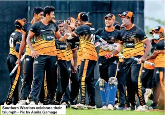  ??  ?? Southern Warriors celebrate their triumph - Pic by Amila Gamage