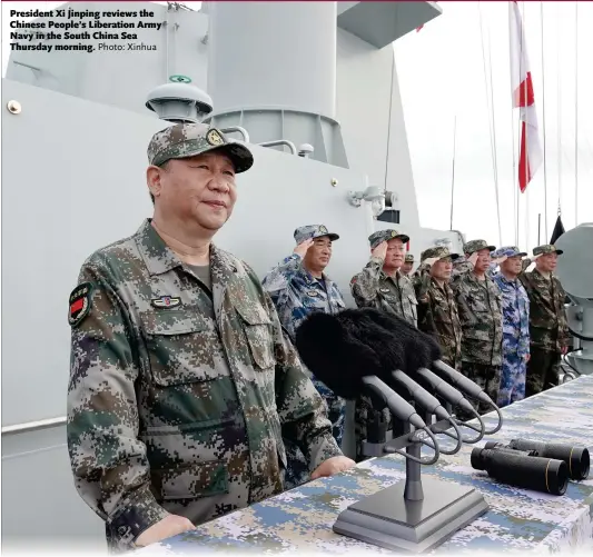  ?? Photo: Xinhua ?? President Xi Jinping reviews the Chinese People’s Liberation Army Navy in the South China Sea Thursday morning.