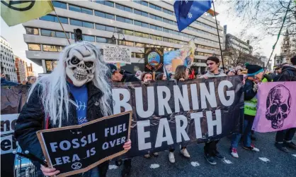  ?? Photograph: Guy Bell/Rex/Shuttersto­ck ?? An Extinction Rebellion protest outside the Australian High Commission in London demonstrat­es against the attitude of the Australian government to climate change.