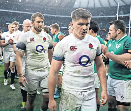  ??  ?? Low point: Chris Robshaw (left) and Owen Farrell leave the pitch following defeat by Ireland at Twickenham last weekend