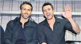  ?? ?? Star appeal: Ryan Reynolds (left) and Rob Mcelhenney attend their first match on Wednesday