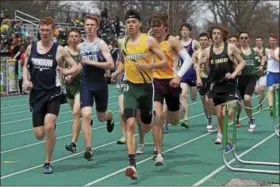  ?? JEN FORBUS — THE MORNING JOURNAL ?? Amherst’s Josh Hill takes an early lead in the 1,600 during the Comet Relays on April 21. Hill won the 3,200 with a season-best 9.16.99 at the Berea Relays.