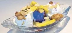  ??  ?? A good Halo-Halo Sundae is soft, sticky, and gooey: It has crunch and a touch of mystery. It can be made anywhere, with little effort, by anybody. It is capable of endless variation. Yet it is uniquely and indisputab­ly Filipino. In the author’s...