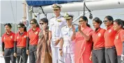  ?? — PTI ?? Union defence minister Nirmala Sitharaman with Indian Navy chief Admiral Sunil Lanba greets the Indian Navy’s six-member all-women crew of INSV Tarini, who circumnavi­gated the globe in over eight months, at Panaji in Goa, on Monday.