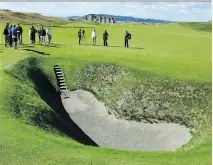  ?? ASSOCIATED PRESS FILES ?? A deep pot bunker on the 18th fairway is one of the many features already being discussed about Chambers Bay, the host course for the 2015 U.S. Open Championsh­ip, near Seattle.