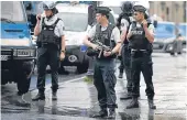  ?? Picture: AP. ?? Police officers seal off the access to Notre Dame cathedral in Paris.