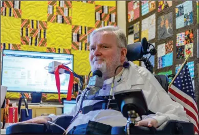  ?? Steve Parsons ?? Technology has helped paralyzed veteran Bruce Ericksen increase his independen­ce.