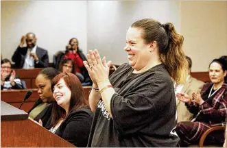  ?? CHRIS STEWART / STAFF ?? Through their efforts and help during a specialty court, Jennifer Buehler, pictured, and Eddie Thomas were returned custody of their 11-year-old son last week. They were both congratula­ted Wednesday in Montgomery County Juvenile Court’s Family Treatment Court.