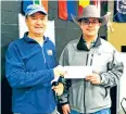  ?? COURTESY PHOTO ?? Trout Unlimited Truchas Chapter’s scholarshi­p chairman, Michael Jozwiakows­ki, awards Monte del Sol Charter School student Fabian Larranaga with the inaugural college scholarshi­p earlier this month.