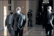  ?? Sarah Silbiger / Getty Images ?? Senate Majority Leader Mitch Mcconnell, R-KY, walks from his office to the Senate floor following a meeting with Supreme Court Nominee Amy Coney Barrett at the U.S. Capitol on Sept. 30 in Washington.