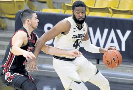  ?? Cliff Grassmick / Staff Photograph­er ?? Colorado’s Jeriah Horne, right, is shooting better than 50% from the floor overall, with a 45.9% clip from 3-point range as the Buffs head toward the postseason.