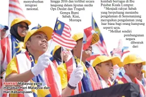  ??  ?? RAKYAT Malaysia yang meraikan Hari Malaysia dan Hari Kebangsaan.