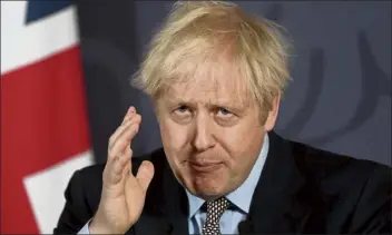  ?? WPA pool / getty IMAGES ?? british prime Minister boris Johnson holds a press conference on reaching a brexit trade deal in downing street on thursday in london.