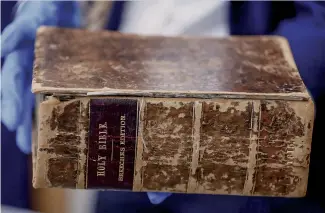  ??  ?? A 1615 Bible, stolen by Priore from nd the Carnegie Library in Pittsburgh in the 1990s and sold to the American Pilgrim Museum in the Netherland­s.