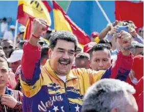  ?? RAYNER PEÑA / EFE ?? Nicolás Maduro, con su caracterís­tico chándal, en una marcha chavista en Caracas, en enero del año pasado.