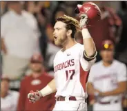  ?? NWA Democrat-Gazette/BEN GOFF ?? Arkansas Razorbacks left fielder Luke Bonfield celebrates at home plate during the bottom of the third inning after hitting one of the team’s five home runs in their 14-4 victory over Georgia at Baum Stadium in Fayettevil­le on Thursday.