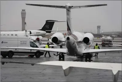 ?? (AP) ?? Planes are parked at a private jet terminal at Harry Reid Internatio­nal Airport ahead of the Super Bowl, Feb. 1 in Las Vegas.