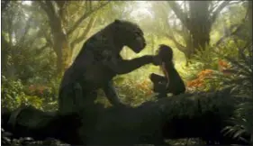  ?? NETFLIX VIA AP ?? This image released by Netflix shows Rohan Chand as Mowgli, right, and the character Bagheera, voiced by Christian Bale, in a scene from the film, “Mowgli: Legend of the Jungle,” streaming on Netflix.