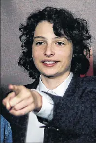  ?? CP PHOTO ?? Actor Finn Wolfhard, who stars as Mike in the Netflix series “Stranger Things”, stops to pose for photos at a red carpet event in Mexico City on Aug. 2. A year after starring in Netflix’s sci-fi/supernatur­al hit, Wolfhard says his life has been...