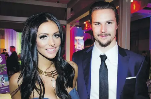  ?? ASHLEY FRASER / POSTMEDIA NEWS ?? Melinda Karlsson, with husband, Ottawa Senators captain Erik Karlsson, alleges that the fiancée of Senators forward Mike Hoffman harassed her online as she dealt with the still birth of her son last March.