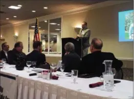  ?? TYLER RIGG — THE NEWS-HERALD ?? Willowick Mayor Rich Regovich jokes with Eastlake’s Mayor Dennis Morley while talking about Eastlake’s Buckeye Relief medical marijuana facility.