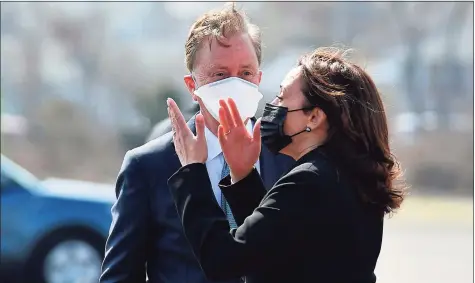  ?? Mandel Ngan / AFP via Getty Images ?? Vice President Kamala Harris is welcomed by Gov. Ned Lamont as she arrives at Tweed-New Haven Regional Airport in New Haven on Friday, where she held a listening session and visited a child care center.