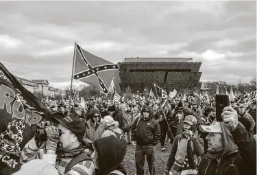  ?? Jason Andrew / New York Times ?? Supporters of then-President Donald Trump rally as he speaks in Washington, D.C., on Jan. 6. In attendance were militias, white supremacis­ts and adherents of the QAnon conspiracy, who went on to storm the Capitol.