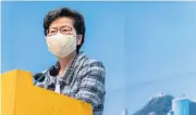  ?? BLOOMBERG ?? Carrie Lam speaks while wearing a protective mask during a news conference in Hong Kong yesterday.