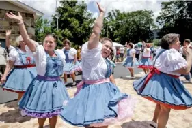  ?? STAFF PHOTOS BY DOUG STRICKLAND ?? The Clog Wild Cloggers perform Saturday during the Memories of Mayberry Festival in Valley Head, Ala. The festival, named for the fictional North Carolina town from “The Andy Griffith Show,” benefits the Valley Head fire department.