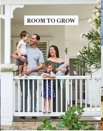  ?? ?? 2 2. The family on the front verandah.