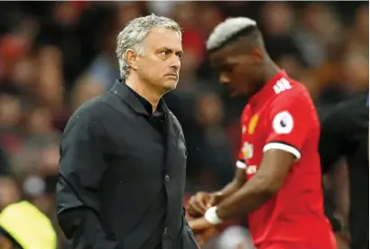  ?? — Reuters ?? Manchester United manager Jose Mourinho reacts as Paul Pogba is substitute­d during the game against West Brom.