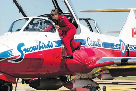  ?? DAVID BLOOM ?? Captain Sarah Dallaire and members of the Canadian Forces Snowbirds arrive at the Camrose Municipal Airport on Tuesday.