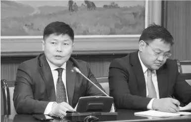  ??  ?? Head of Standing Committee on Law MP Kh.Nyambaatar (left).