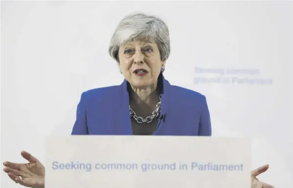  ??  ?? 0 Theresa May gave a speech in London yesterday in which she made commitment­s over Northern Ireland, workers’ rights and environmen­tal protection­s