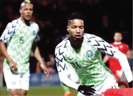  ??  ?? Super Eagles’ Tyronne Ebuehi (right) and William Troost-Ekong (in background) during the internatio­nal friendly with Serbia in London last week