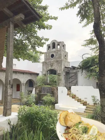  ??  ?? A bell tower overlookin­g Pinto Art Museum