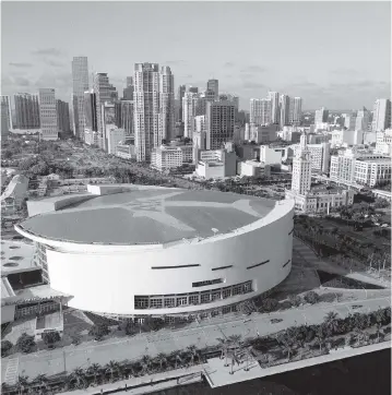  ?? PEDRO PORTAL Herald file | May 30, 2019 ?? A north-to-southeast view of the Miami skyline. After two decades as AmericanAi­rlines Arena, the venue could be renamed the FTX Arena, with the iconic American plane image stripped from the roof.