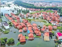  ?? AFP ?? Since last month, continuous downpours have lashed large parts of southern China, and the waters of many rivers in affected areas have exceeded warning levels.